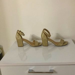 Some cute glittery gold high heels